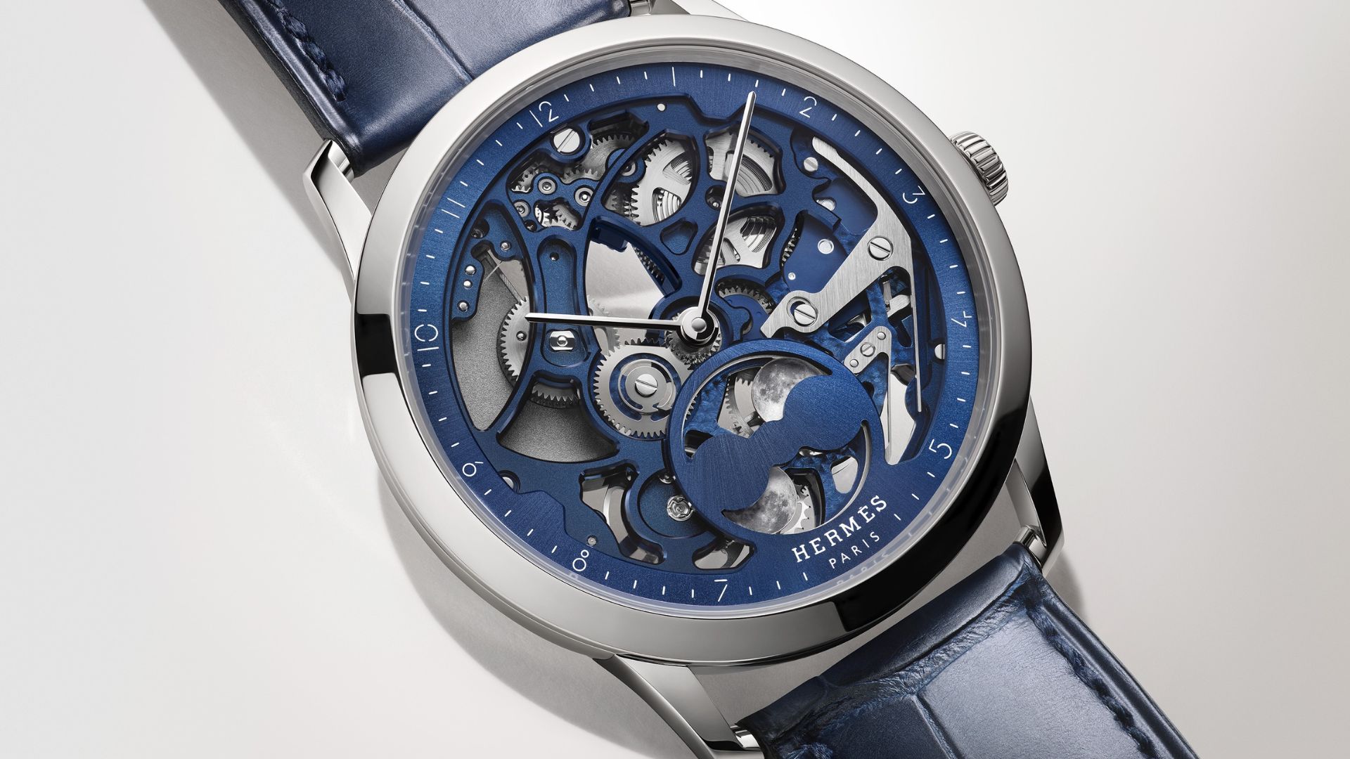 Hermès doubles down on twin moon displays for new Slim d'Hermès